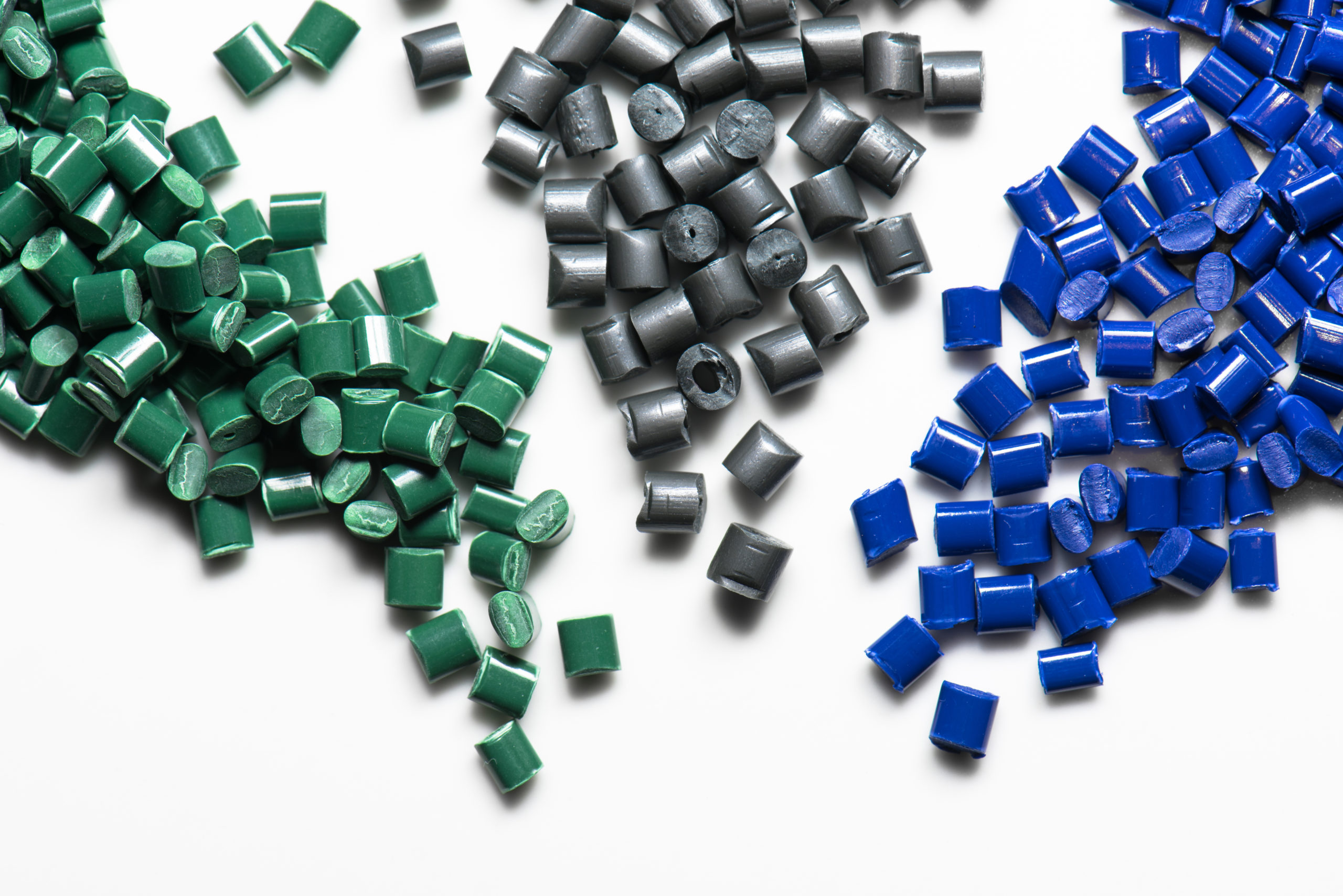 bue, grey and green plastic granulate for injection molding
